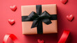 © creative - Peach gift box with black ribbon, red hearts, and ribbon, Valentine's Day, red background; ideal for cards, websites, blogs