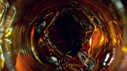 Poster - Super Slow Motion of Turning Shot of Whiskey or Rum, Top View Shot. Filmed on High Speed Cinema Camera, 1000 fps. Low Depth of Focus. Super Macro.