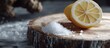 © StockKing - Fresh lemon half with visible seeds placed next to a heap of coarse salt on a rustic wooden slice against a blurred background emphasizing keto elements.
