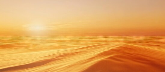 Poster - Golden sunset over tranquil waves creating a warm gradient of oranges and yellows, with soft ripples in the foreground and horizon blending smoothly.