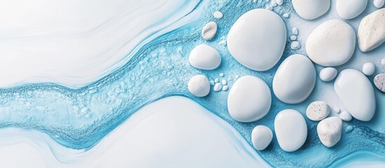 Poster - Abstract art background featuring smooth white stones nestled within soothing blue water, highlighting elegant textures and a serene composition.