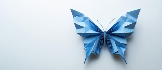 Poster - Blue origami butterfly with sharp folded edges centered on a blank white background, featuring various shades of blue and intricate design details.