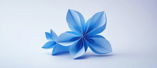 Aufkleber - Blue floral origami sculpture featuring layered petals in soft blue tones positioned artistically on a light gradient background for a calm aesthetic.