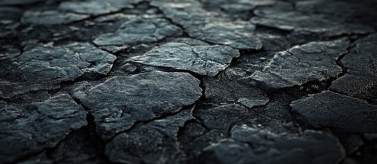 Poster - Dark asphalt texture background with deep tones and cracked surface, highlights shadows and uneven patterns for versatile design applications.