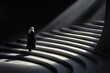 © Marina Varnava - Person walking up a winding staircase illuminated by soft beams of light in a shadowy environment