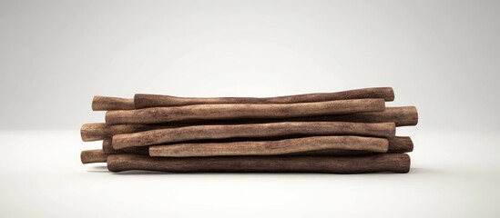 Leinwandbilder - Bundles of brown firewood stacked neatly on a light gray surface showcasing natural texture and warmth in a minimalistic composition.