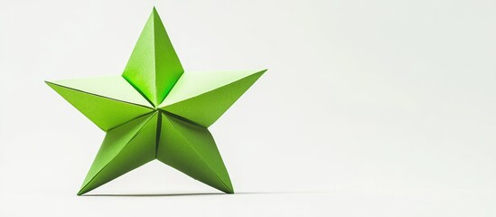Leinwandbilder - green origami star centered on a soft white background with smooth shadows, showcasing a vibrant thr