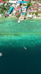 Wall Mural - Aerial view of shore of Moalboal with hotels and dive centers. A popular place for divers. Philippines, Cebu.