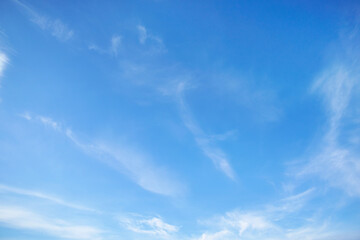 Wall Mural - beautiful blue sky with soft white clouds for abstract background