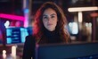 © Sebelas Studio - Portrait of a confident female programmer working in a neon-lit tech office