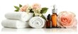 © pngking - Spa day essentials with towels, essential oils, and delicate rose flowers arranged for a soothing and rejuvenating experience on white backdrop.