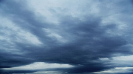 Wall Mural - time lapse of sky with dark clouds, dramatic sky, storm clouds