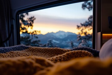 Wall Mural - Cozy camper interior view to snowy mountains at sunset, travel and adventure