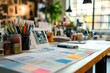 © Gatherina - Designer working on creative project using pencils and sticky notes in modern office