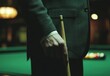 © Khmel - Man in suit holding a cue stick near a billiard table at night