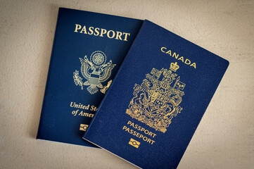 Different passports with golden emblems