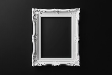 Wall Mural - Elegant white picture frame on a dark wall ready to hold cherished memories and art pieces