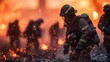 © maxximmm - Firefighter in the foreground with large fire. Firefighters rescue firefighter. A man is training a firefighter. A firefighter in the front near lifestyle a big blaze.