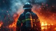 © Tai - Firefighter in uniform standing in front of flames during incident response planning session