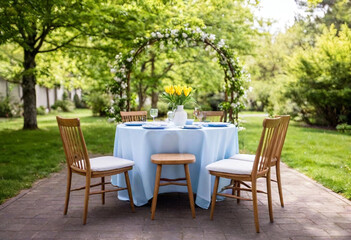 Intimate Garden Setting: A small round table set under an arbor with pastel blue and yellow linens, mismatched vintage china, and a bouquet of wild tulips in a rustic basket. Candlesticks with drippin