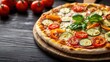 © Alla Bondaruk - Colorful vegan potato pizza topped with roasted zucchini, bell peppers, and cherry tomatoes garnished with fresh basil