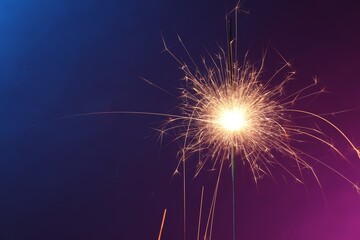 Wall Mural - Bright burning sparkler in color lights, closeup. Space for text