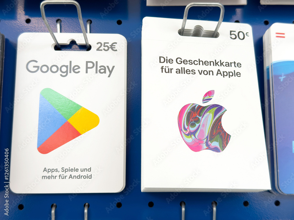 Google play and apple gift cards on display at retail store Stock Photo ...