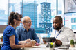 © DC Studio - Senior people in a consultation with a financial expert to discuss about retirement plans, covering investment strategy to secure life savings and financial security. Insurance agency broker.