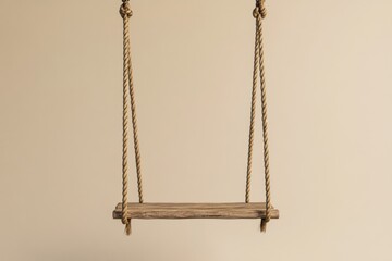 Wall Mural - Hanging wooden swing suspended by thick beige rope indoors