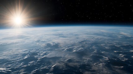 Wall Mural - stunning view of earth from space. the sun rises over a cloud-covered planet, creating a breathtakin