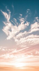 Wall Mural - Pastel Sunset Sky With Wispy Clouds