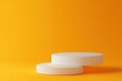 © kribbox - White product display stand on orange background