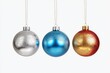 © vefimov - Colorful Christmas baubles hanging together in a trio, showcasing gold, silver, blue, and red. These ornaments can be used for holiday decoration or as a festive accent to a wreath.