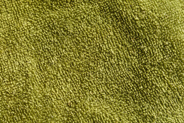 Poster - A green towel with a fuzzy texture