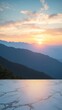 © Giuseppe Cammino - Business concept - Empty marble floor top with panoramic sky view of mountain under sunrise and morning blue bright sky for display or montage product