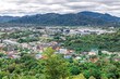Panoramic nature background of the landscape with views of mountains, sea, trees and fishermen's houses. The beauty of the forest during the seasonal tourism season.
