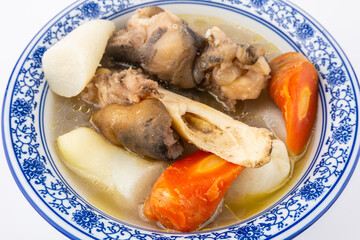 A bowl of carrot stewed with beef trotter bone soup