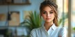 © Georg - Young woman with long hair in a white shirt poses confidently in a bright indoor setting surrounded by greenery