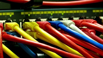 Wall Mural - network server room server rack with fiber optic cables attached to front panel switch ports