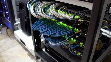 Wall Mural - Close up view internet equipment cables in the server room communication and internet network server