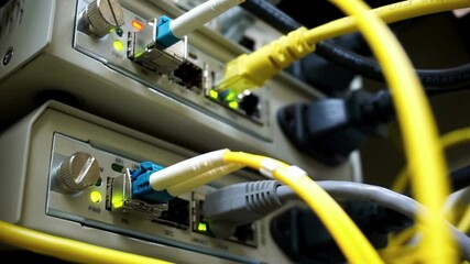 Wall Mural - network server room routers and ethernet cable on network switches background switch ports cables
