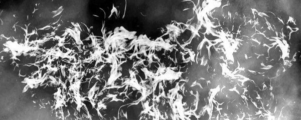 Wall Mural - White fire flames isolated on black background. White smoke flowing on a dark canvas with fog some fog on the side. White smoke swirling stark black background creating mesmerizing abstract art.