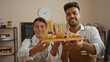 © Krakenimages.com - Woman and man presenting fresh pastries in a cozy bakery with shelves of baked goods in the background and a wall clock indicating indoor business activity