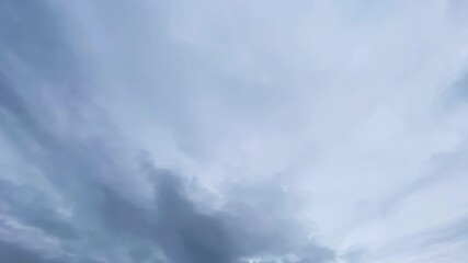 Wall Mural - white cumulus and cirrus clouds flowing on sky. nature, weather, air time lapse background