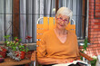 © atikinka2 - portrait of senior woman reading a  book in the garden on summer day