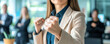 © Pixelmagic - Confident businesswoman making a fist in a modern office