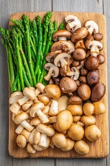 Wall Mural - Freshly harvested mulberry mushrooms, shiitake mushrooms, and asparagus arranged neatly on a rustic wooden table showcasing earthy textures and organic appeal in natural light