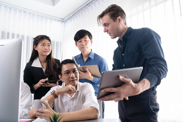 Wall Mural - Group of diverse office worker employee working together on strategic business marketing planning in corporate office room. Positive teamwork in business workplace concept. Prudent