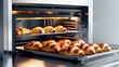 © demzp - Rows of warm, golden croissants bake to perfection inside a modern stainless steel oven.