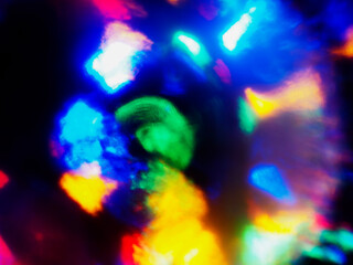 Wall Mural - a colorful, blurry background with a rainbow of colors. the colors are bright and vibrant, creating 